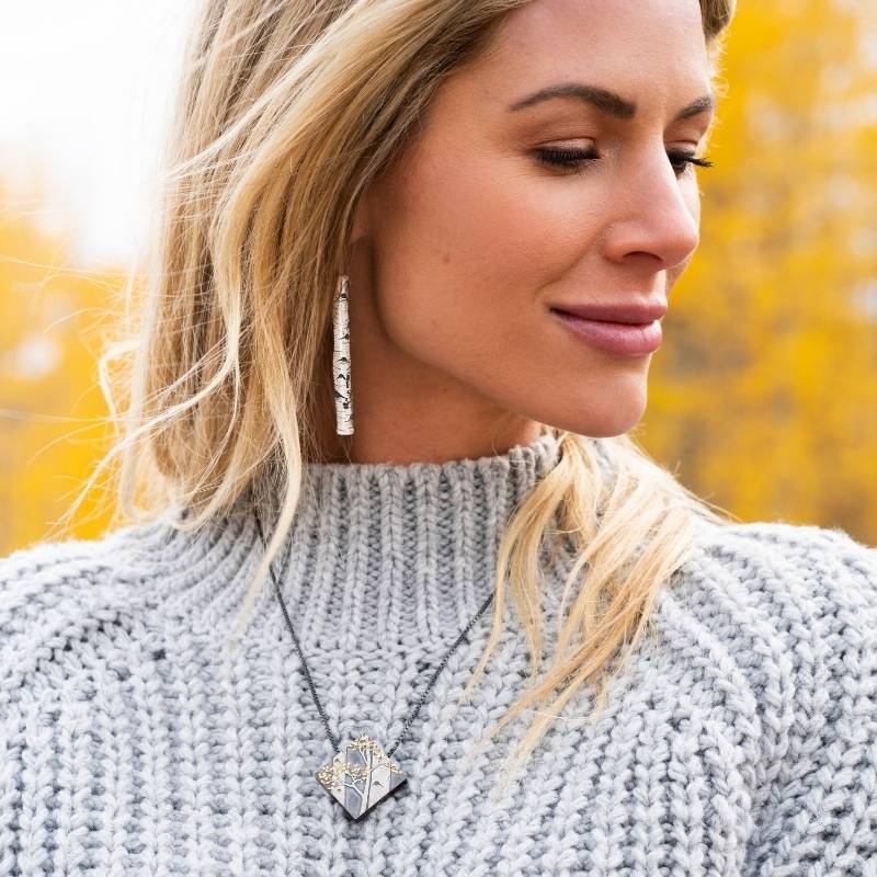 Woman wearing Wolfgang Vaatz necklace and earrings