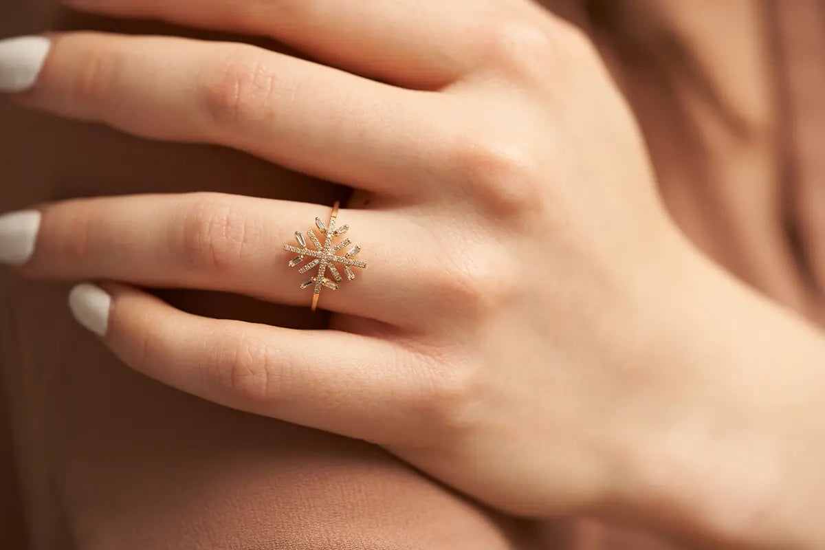 Woman Wearing Snowflake Baguette Ring from Park City Jewelers