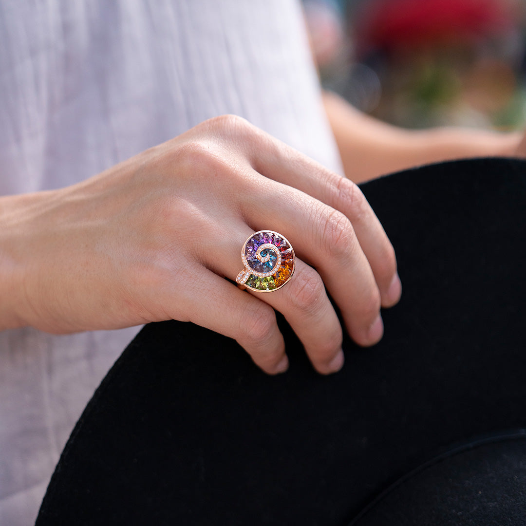 Woman wearing Bellarri rainbow ammonite ring