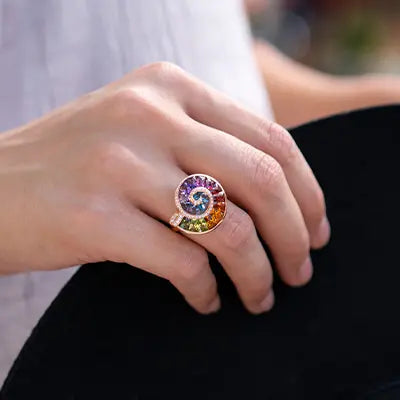 Woman Wearing Bellarri Ammonite Ring by Park City Jewelers