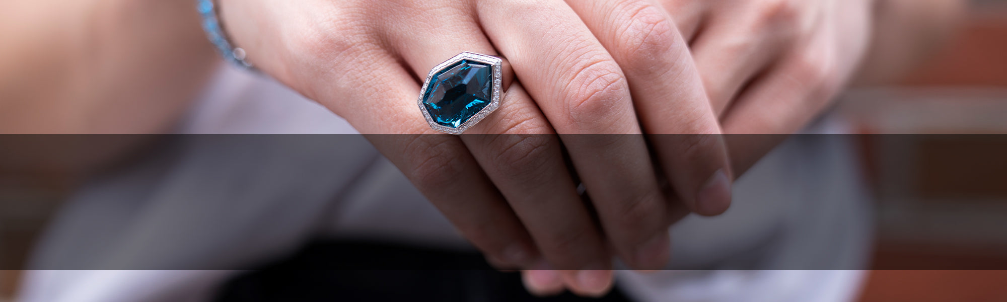 Woman Wearing Bellarri Blue Zircon Ring from Park City Jewelers