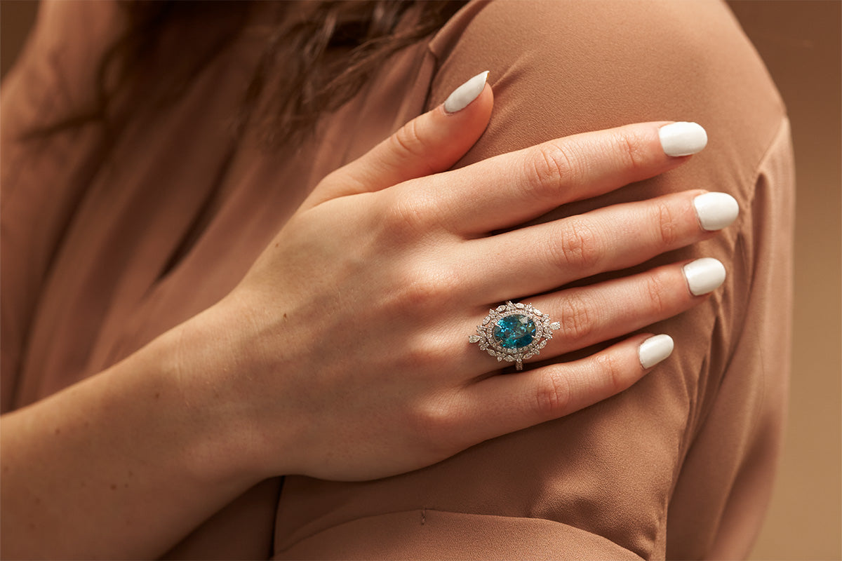 Woman Wearing a Blue Zircon Ring from Park City Jewelers