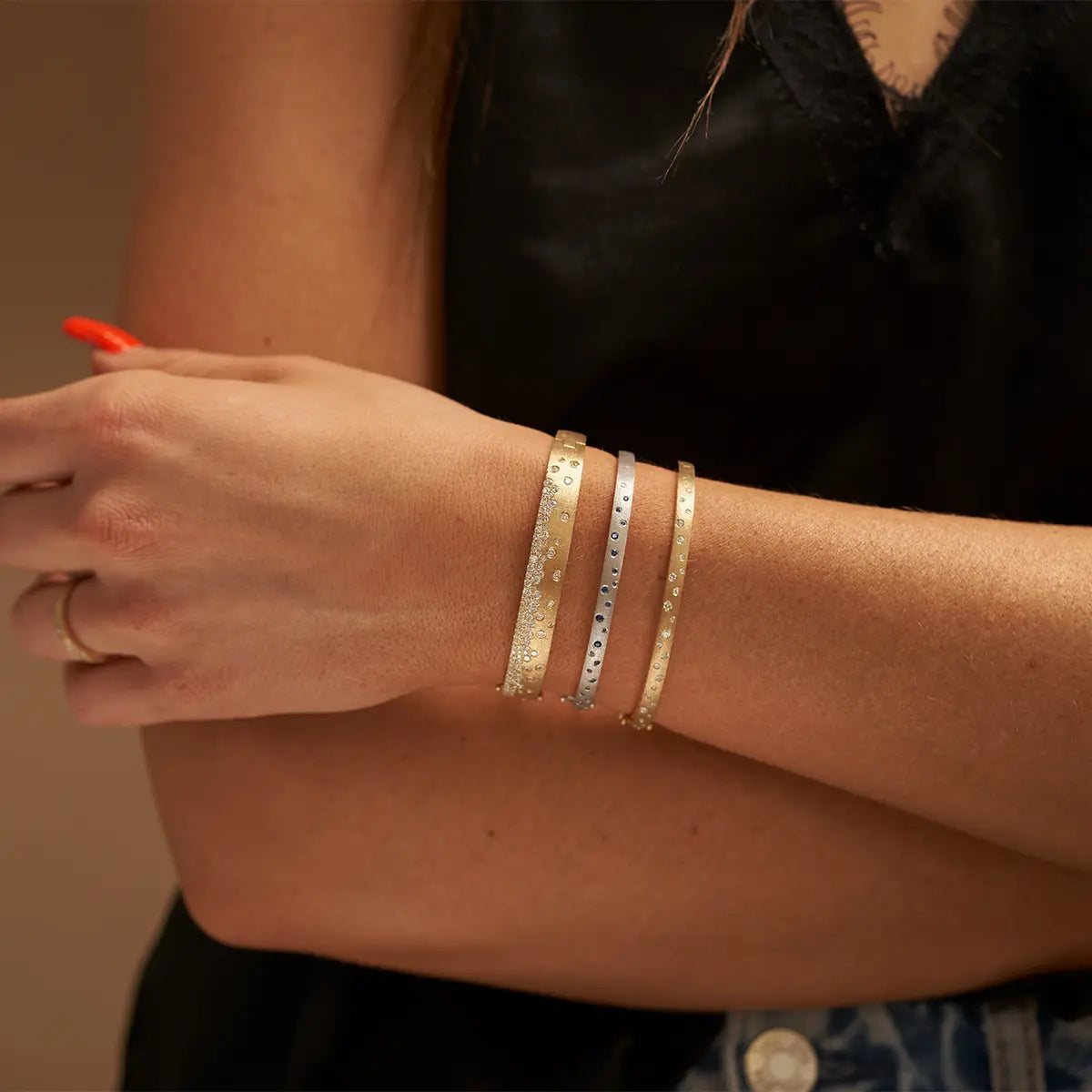 Woman Wearing Three Stacked Confetti Bracelets from Park City Jewelers