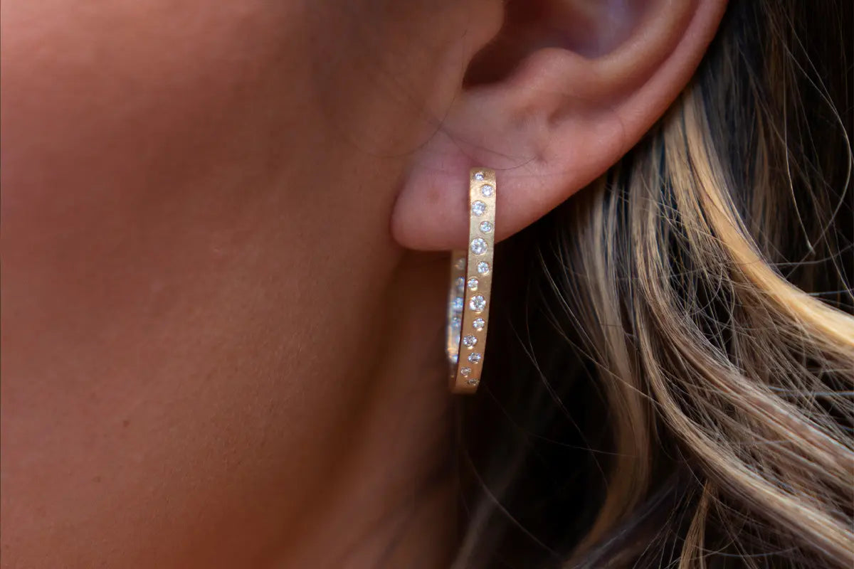 Woman Wearing Confetti Earrings from Park City Jewelers