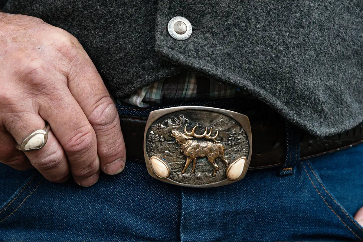 Man Wearing Elk Ivory Belt Buckle from Park City Jewelers