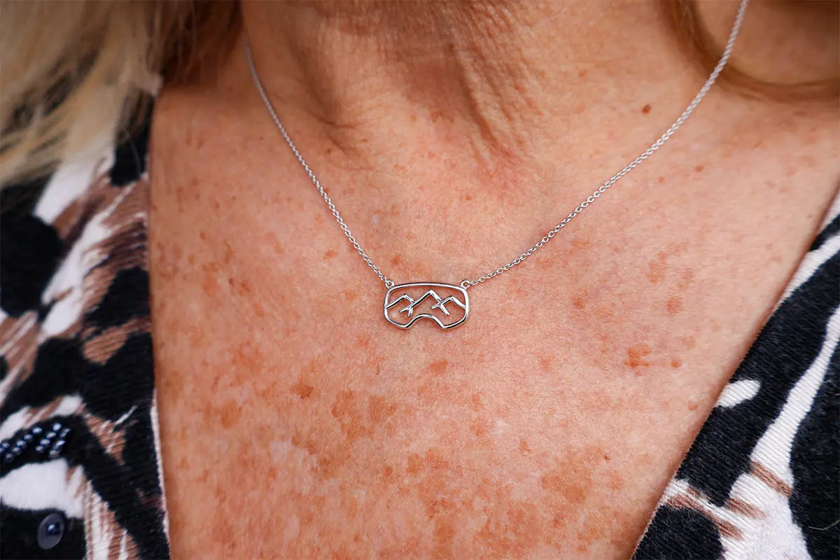 Woman Wearing Sterling Silver Google Necklace from Park City Jewelers. 