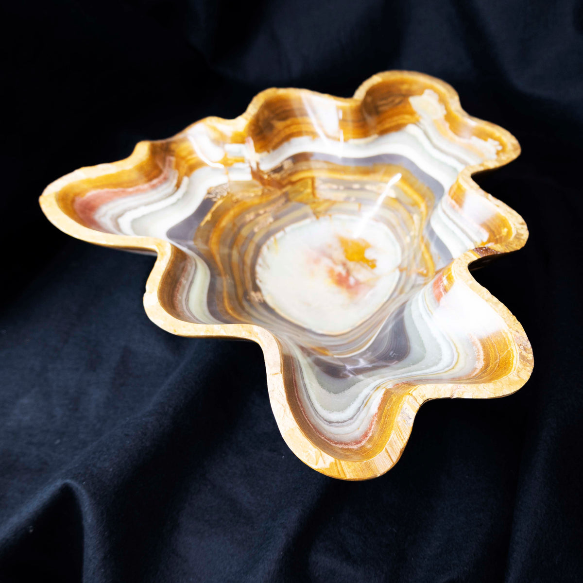 Hand-carved honey colored onyx bowl