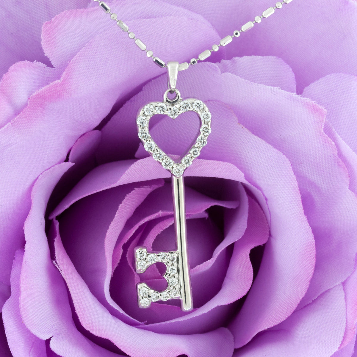 White gold and diamond heart key necklace