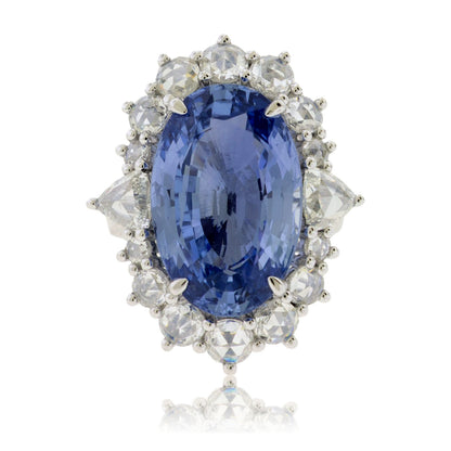 Large Oval Blue Sapphire with Round and Diamond Halo Style Ring