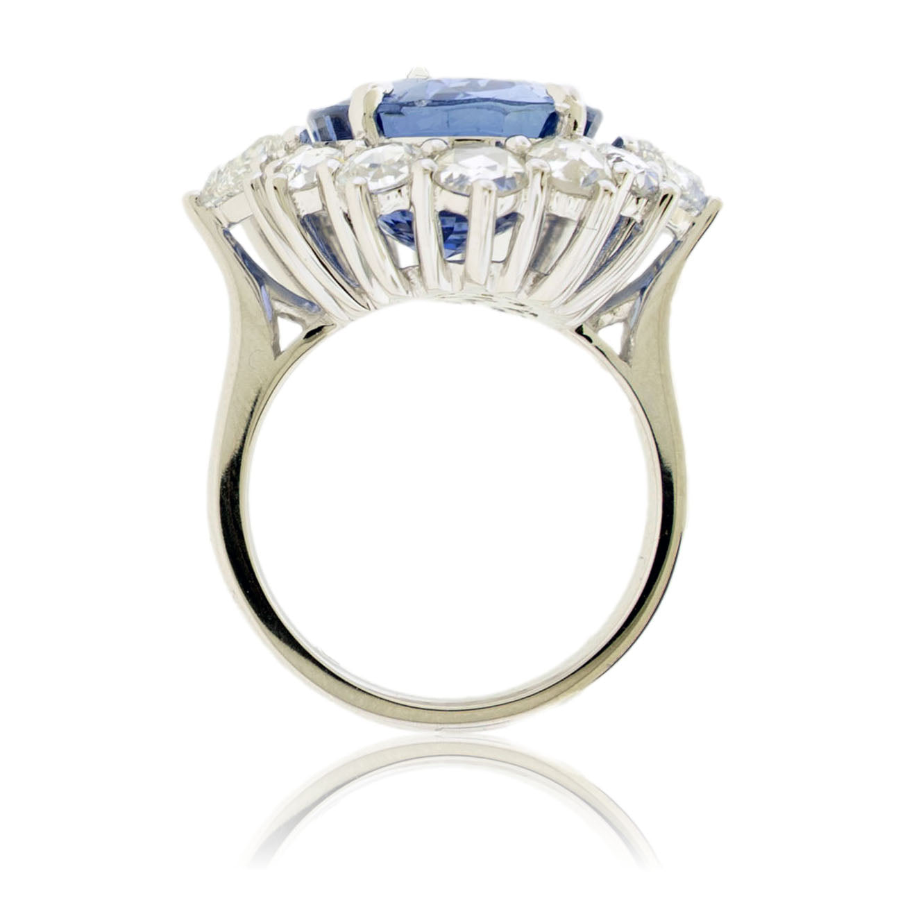Large Oval Blue Sapphire with Round and Diamond Halo Style Ring