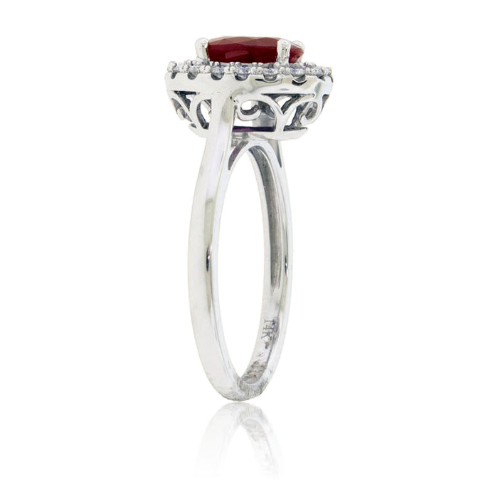 Oval Ruby and Diamond Halo Ring