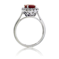Oval Ruby and Diamond Halo Ring