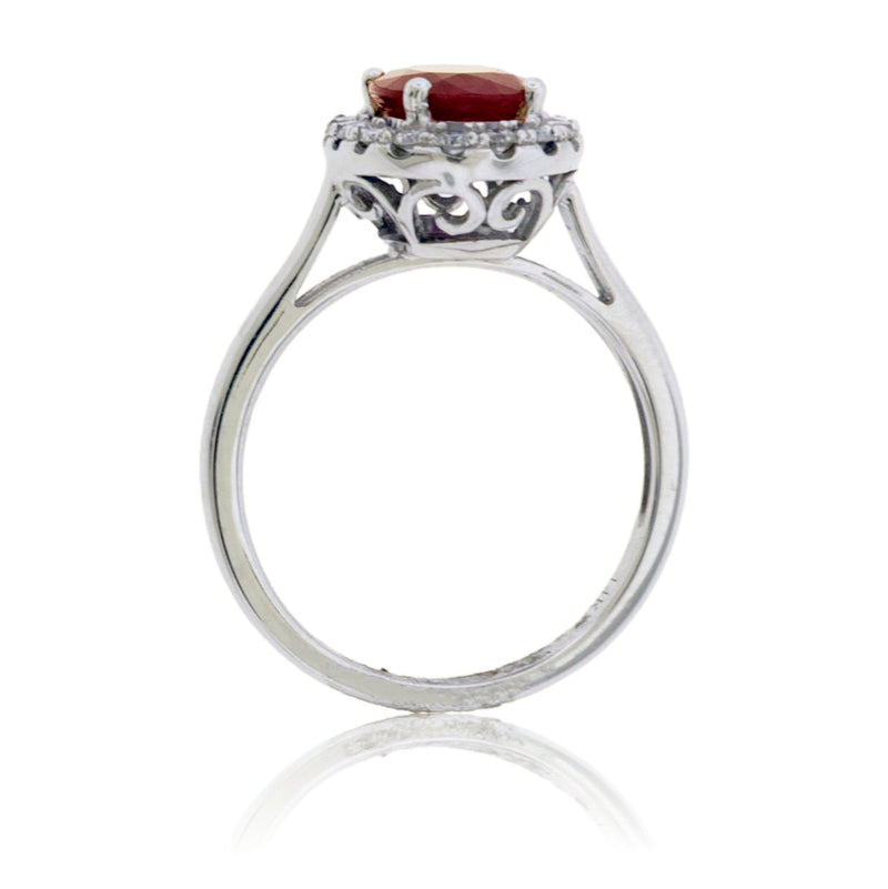 Oval Ruby and Diamond Halo Ring