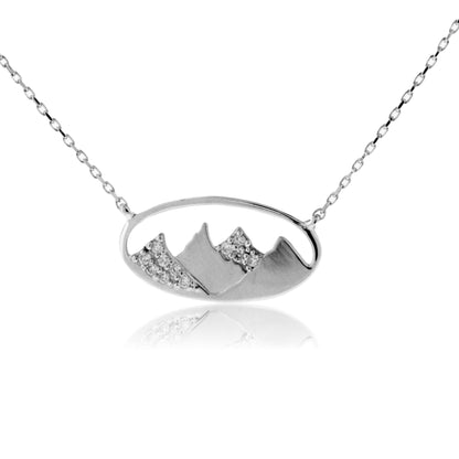 Silver necklace with a mountain pendant on a white background