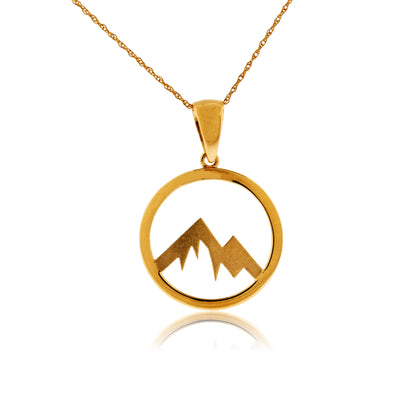 Rose gold necklace with a mountain pendant on a white background