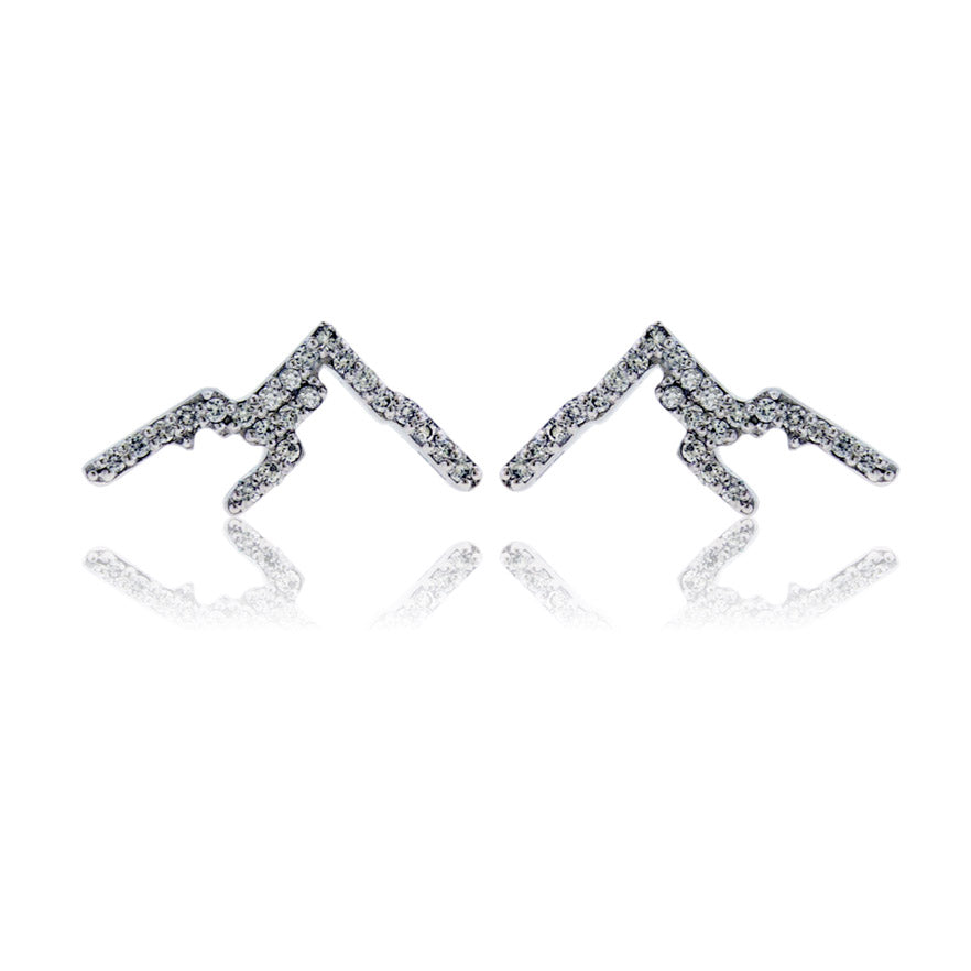 Pair of silver mountain-shaped earrings on a white background