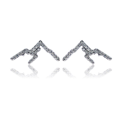Pair of silver mountain-shaped earrings on a white background