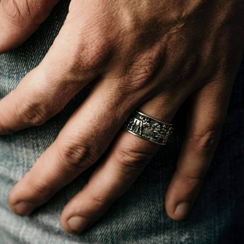Man wearing sterling silver mountain ring by Park City Jewelers. 
