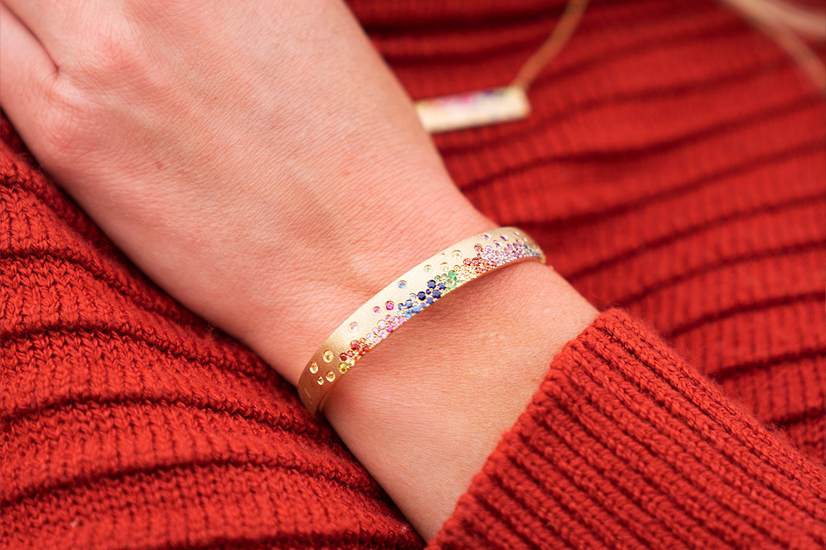 Woman Wearing Rainbow Confetti Bracelet from Park City Jewelers