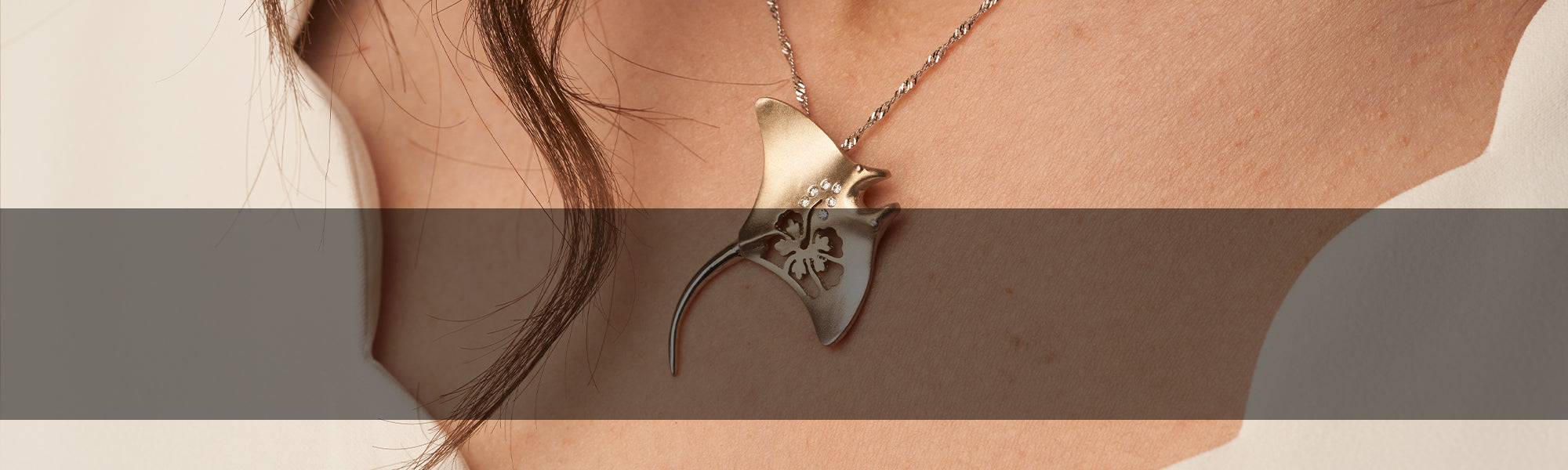 Woman Wearing Manta Ray Pendant by Park City Jewelers