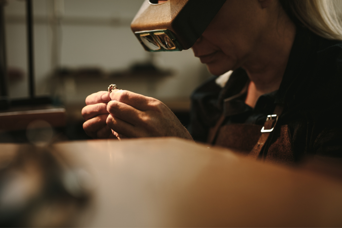 Jeweler Inspecting Ring