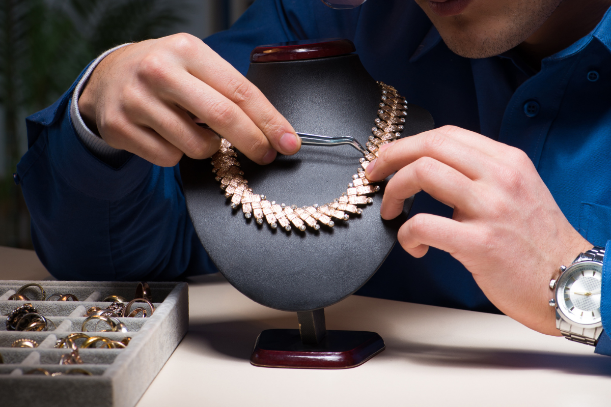 Jeweler Inspecting a Necklace