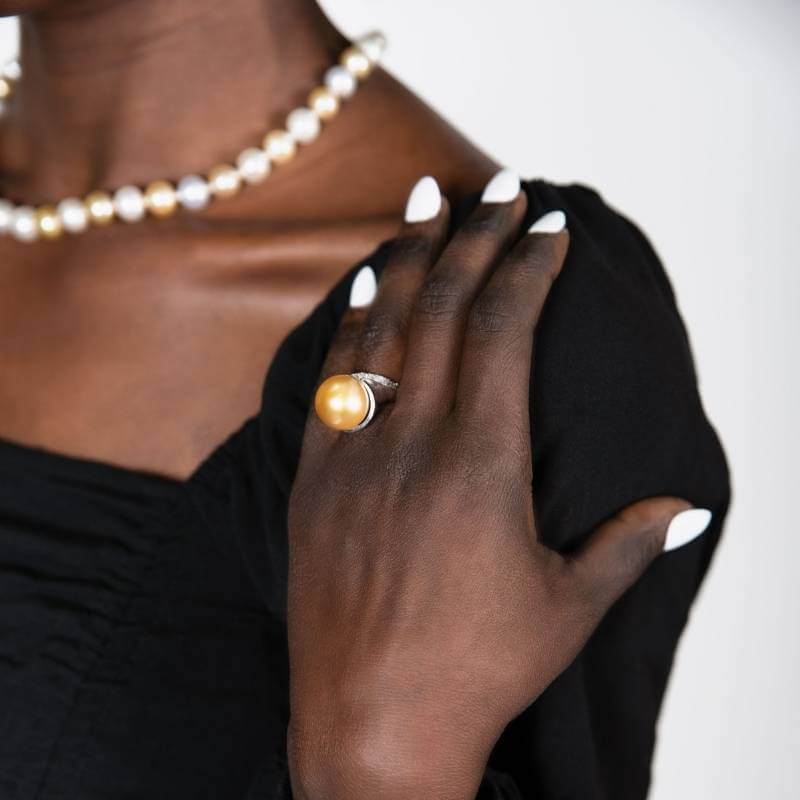 Woman wearing pearl ring