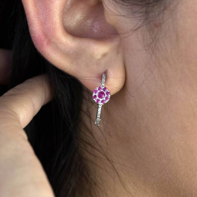 Woman wearing ruby earrings