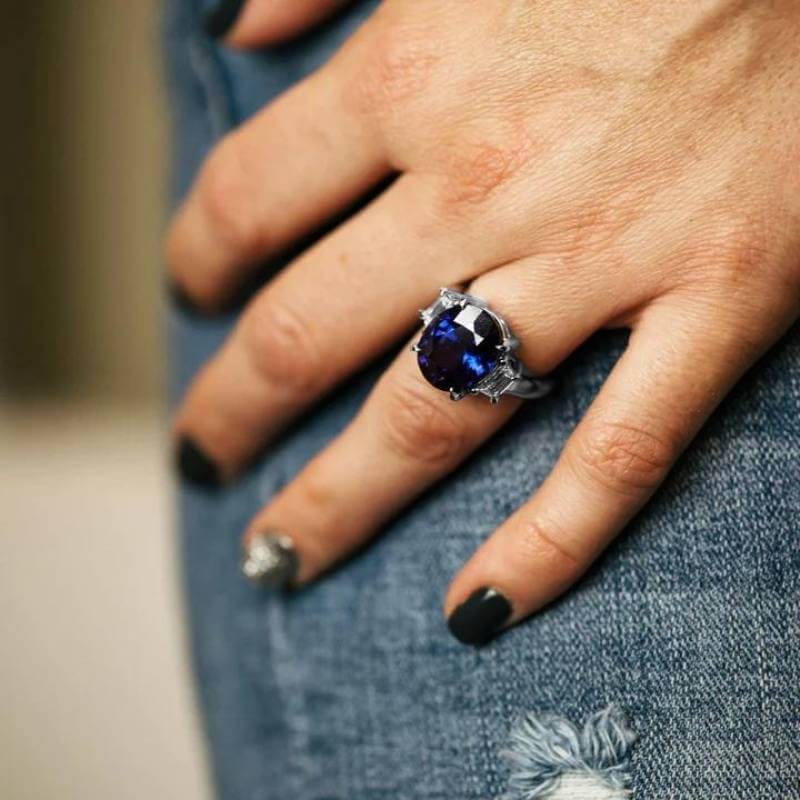 Woman wearing sapphire ring