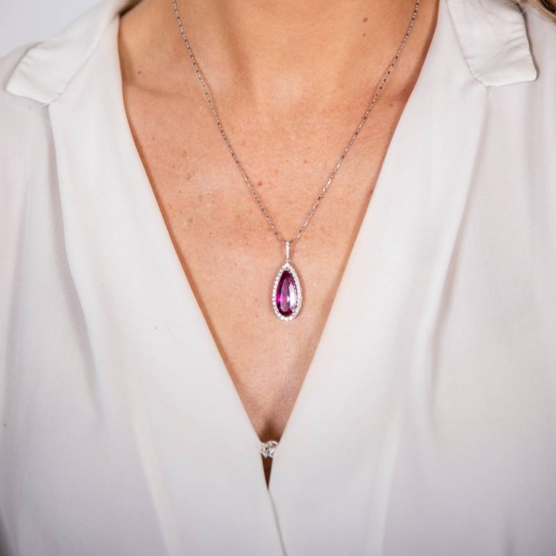 Woman wearing tourmaline necklace