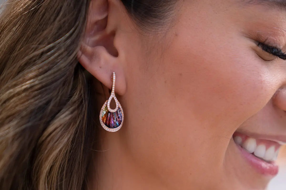 Woman Wearing Bellarri Rainbow Gemstone Earrings from Park City Jewelers