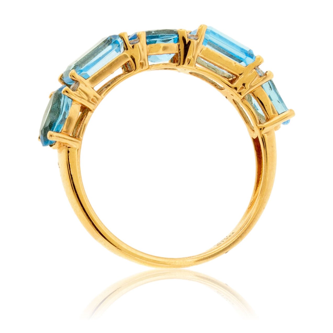Top-down profile of a five-stone blue topaz band, showing the side view of the emerald and oval-cut gemstones set in yellow gold.