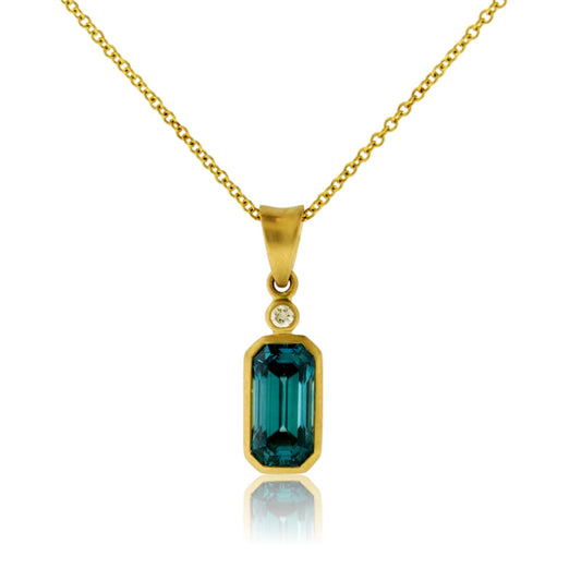 Blue Zircon Emerald - Cut Bezel Set & .03ctw Diamond Pendant - Park City Jewelers