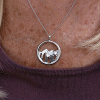 Circle Mountain Scene with Tree Cutout Pendant - Park City Jewelers