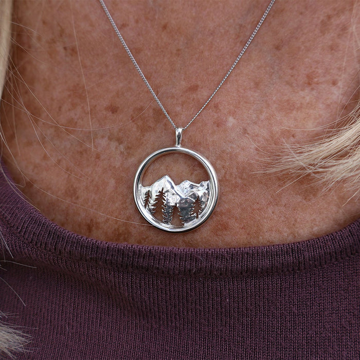 Circle Mountain Scene with Tree Cutout Pendant - Park City Jewelers