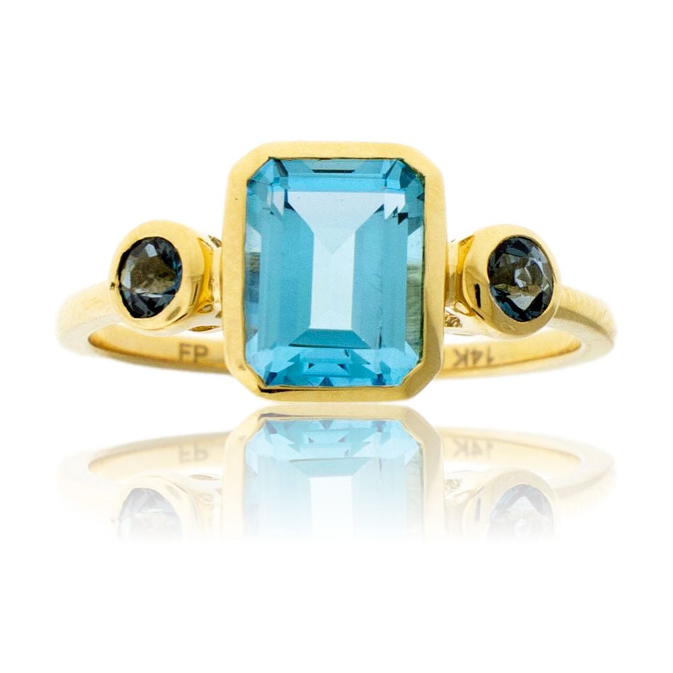 Emerald - Cut Blue Topaz & London Blue Topaz Accented Ring - Park City Jewelers