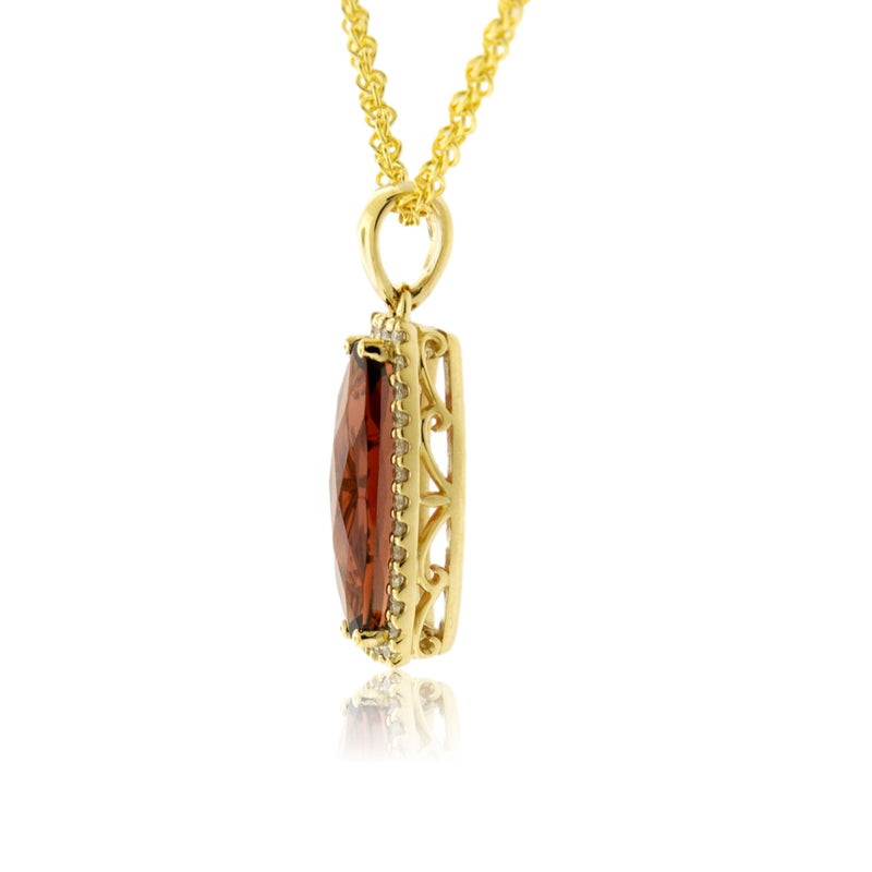 Fancy Cut Garnet & Diamond Halo Accented Pendant - Park City Jewelers