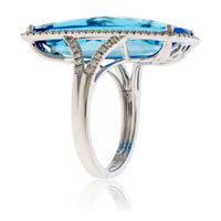 Fancy Cut Oval London Blue Topaz with Diamond Halo Ring - Park City Jewelers