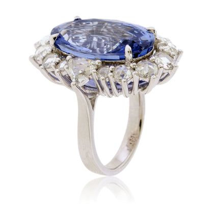 Large Oval Blue Sapphire with Round and Diamond Halo Style Ring - Park City Jewelers