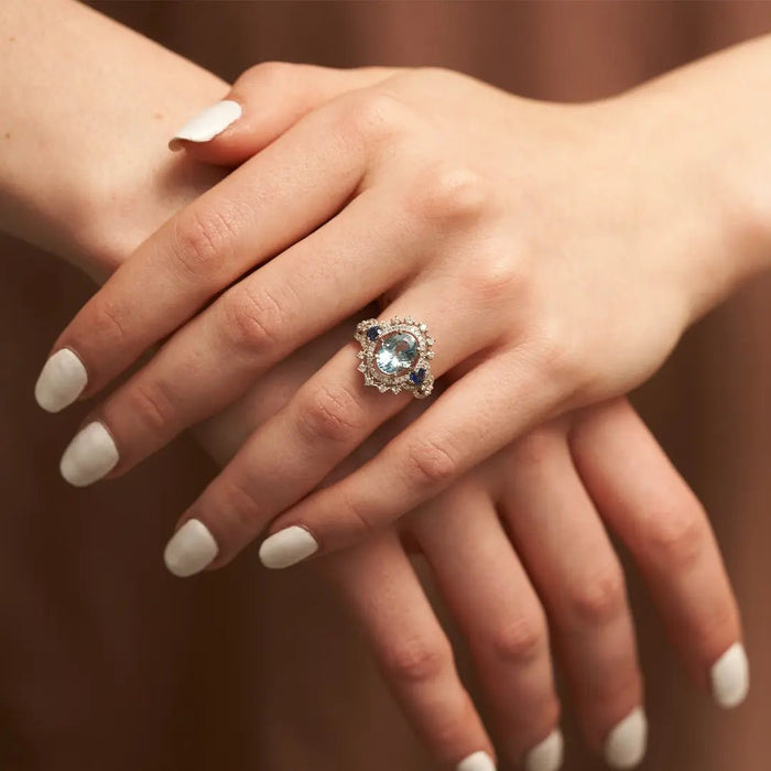 Oval-Cut Aquamarine, Sapphire & Diamond Halo Ring - Park City Jewelers