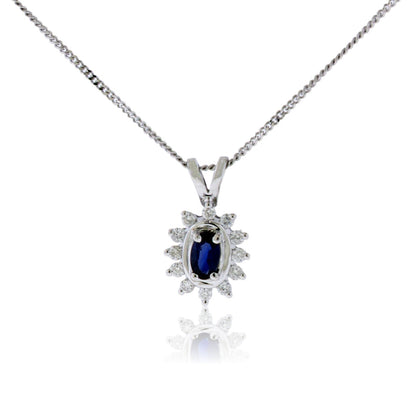 Oval Sapphire & Diamond Burst Halo Pendant - Park City Jewelers