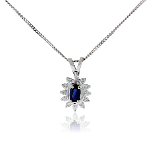 Oval Sapphire & Diamond Burst Halo Pendant - Park City Jewelers