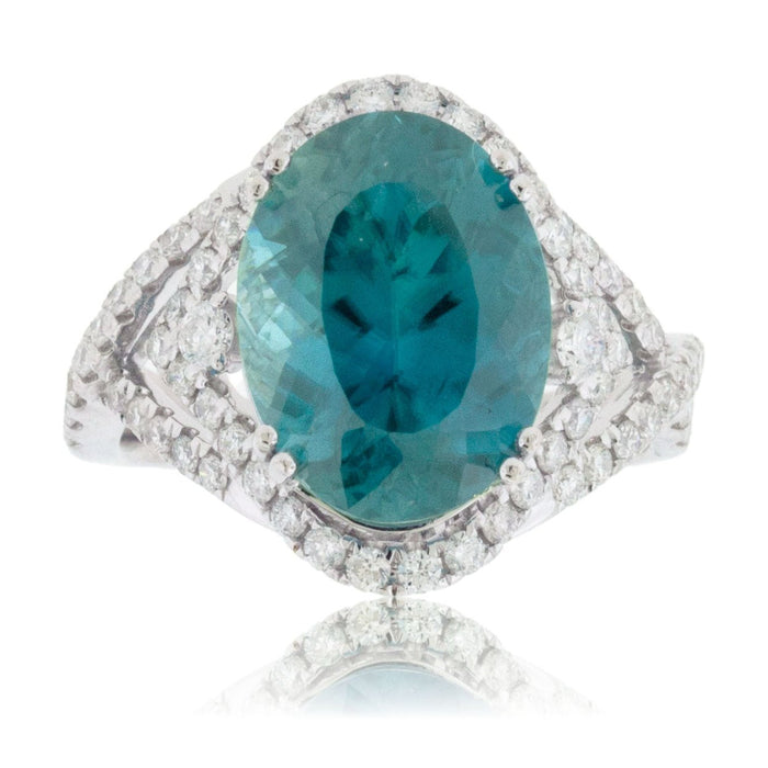 Oval Shaped Blue Zircon with Diamond Halo & Accented Ring - Park City Jewelers