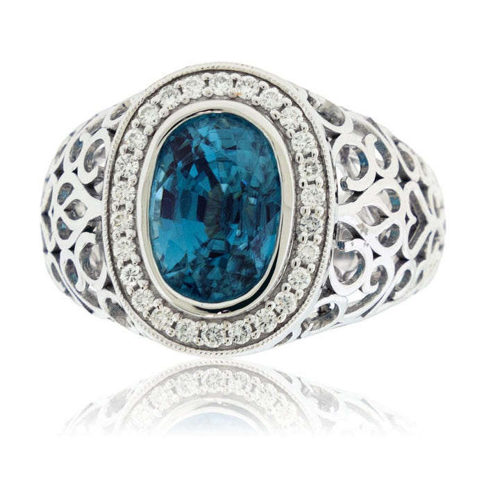 Oval Shaped Blue Zircon with Diamond Halo Filigree Ring - Park City Jewelers