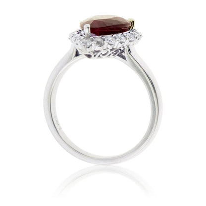 Pear Cut Red Emerald and Diamond Halo Ring - Park City Jewelers