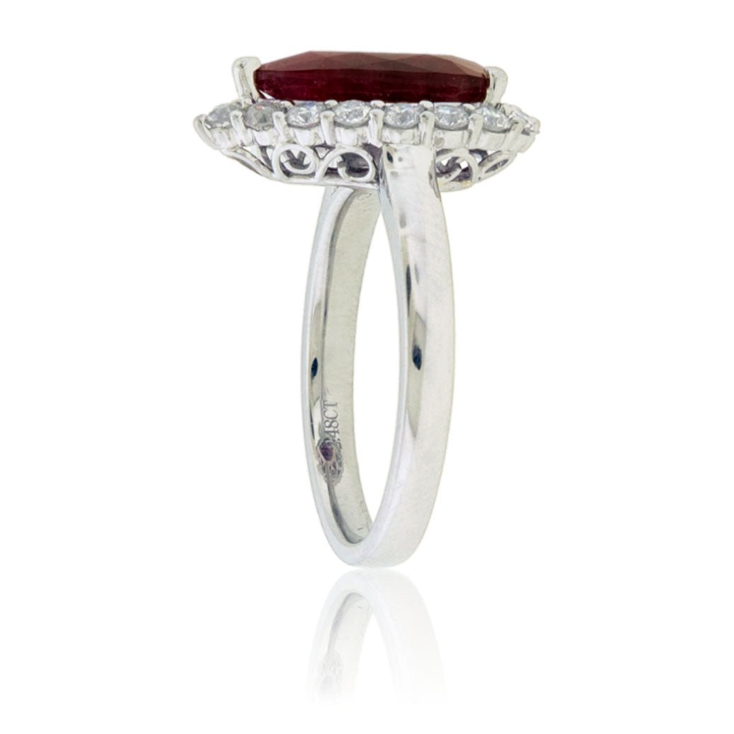 Pear Cut Red Emerald and Diamond Halo Ring - Park City Jewelers