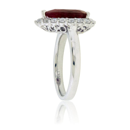 Pear Cut Red Emerald and Diamond Halo Ring - Park City Jewelers