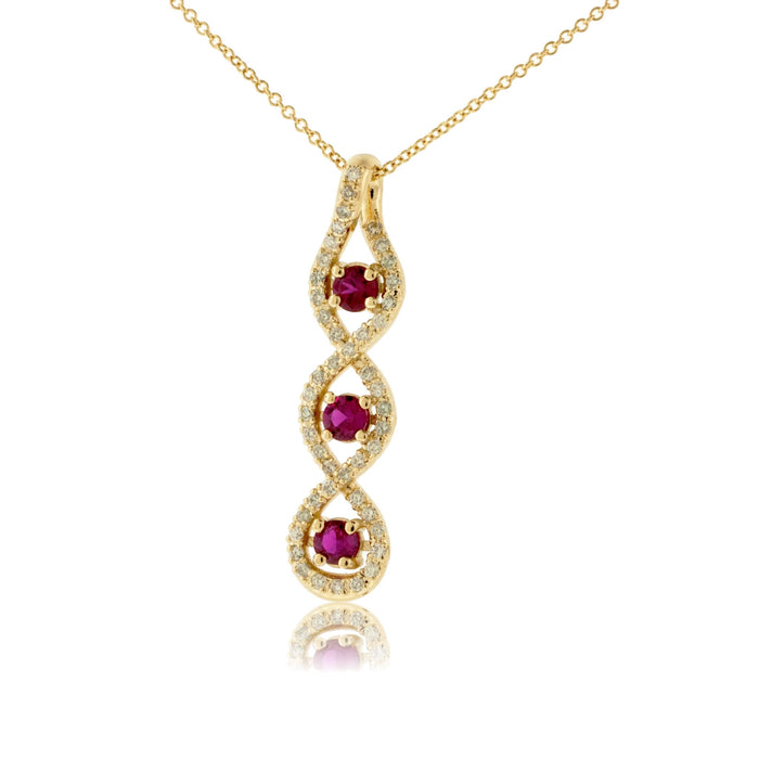 Round - Cut Three Ruby Pendant with Diamond Halos - Park City Jewelers