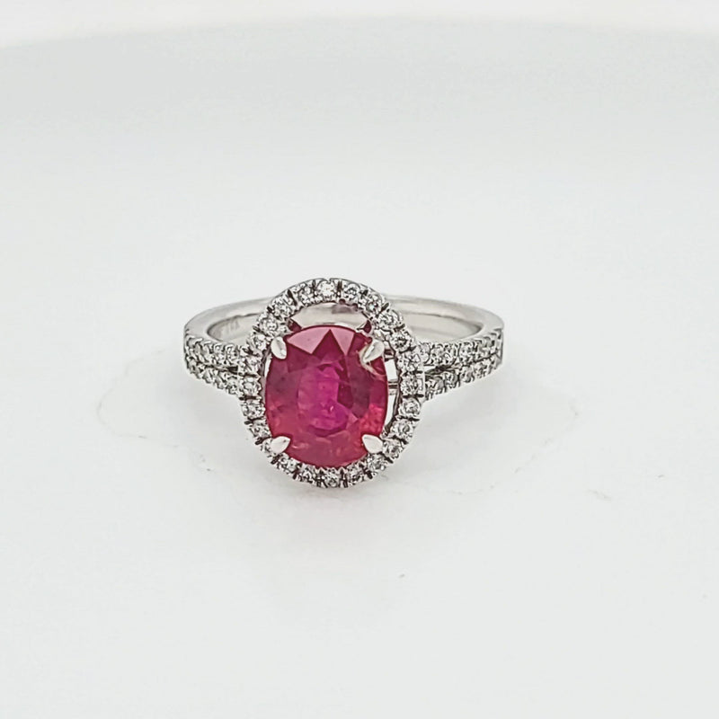Oval Ruby and Split Shank Diamond Halo Ring