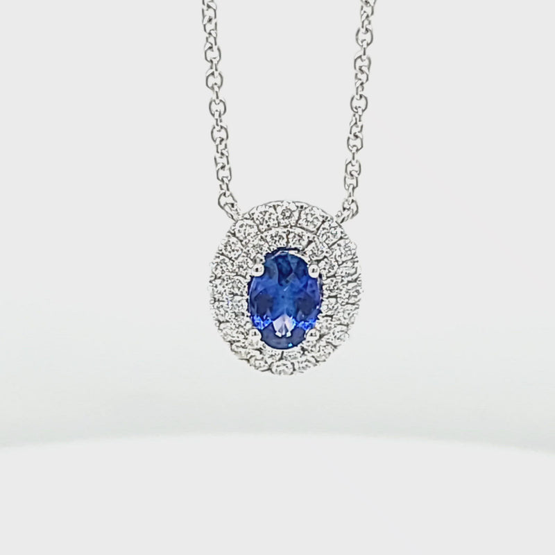 Blue Oval Shaped Sapphire with Double Diamond Halo Pendant